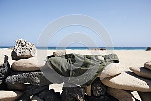 Mens swuimsuit drying on the beach