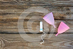 Menstrual cup and tampons