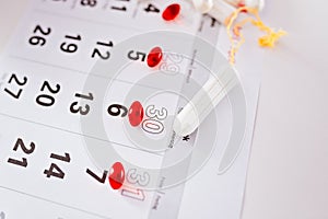 Menstruation calendar and clean cotton tampons