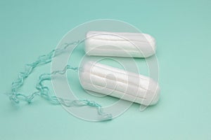 Menstruation cotton tampon for woman hygiene protection. Soft tender protection for woman critical days, gynecological menstruatio