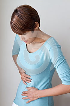 Menstruation pain, period cramp or stomach ache photo