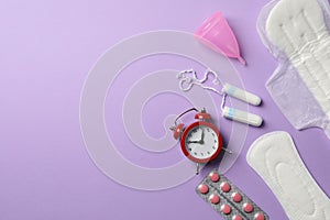Menstruation period concept on violet background