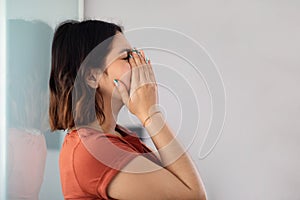 Mental Breakdown. Closeup Portrait Of Young Arab Woman Crying At Home