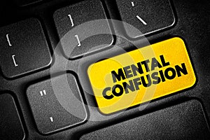 Mental Confusion is the inability to think as clearly or quickly as you normally do, text button on keyboard, concept background