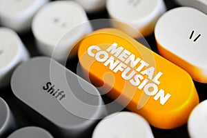 Mental Confusion is the inability to think as clearly or quickly as you normally do, text concept button on keyboard