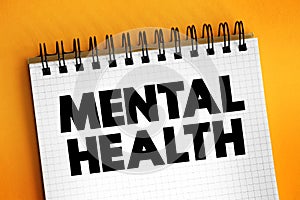 Mental Health - cognitive, behavioral, and emotional well-being, text concept on notepad