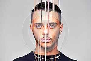 Mental Health Concept With Portrait Of Young Man With Face Obscured By Vertical Lines photo