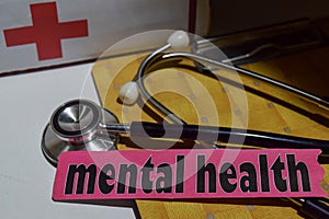 Mental health on the print paper with medical and Healthcare Concept