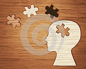 Mental health symbol. Human head silhouette with a puzzle