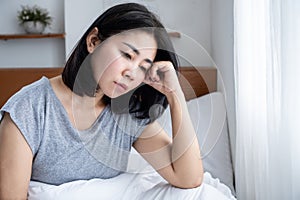 mental health woman overthinking in bed , have problem with sleeping disorder photo