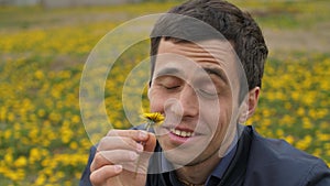 Mentally ill man sniff a flower