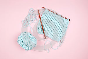 Mentol yarn ball and wodden knitting needle