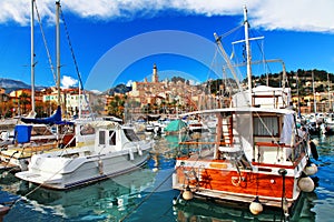 Menton - colorful port town, view with boats. south of France