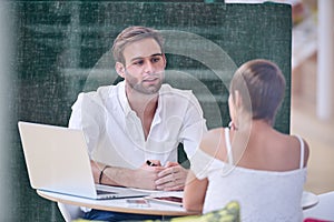 Mentorship between knowledgable male mentor and bright female student photo