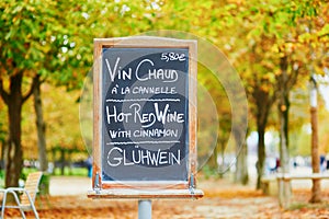 Menu board with words `hot wine` in three languages