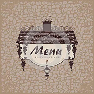 Menu with grapes on a stone wall