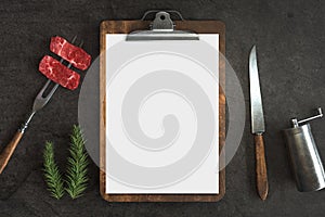 Menu mockup with knife and fork on a Concrete background, Free space for your text