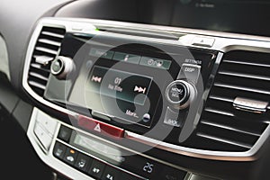 Menu and Select button on multimedia control panel.