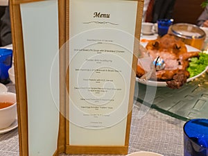 Menu and white bowl in luxury hotel