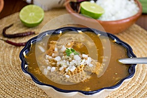 Menudo mexican soup with cow stomach, pancita hot pot photo