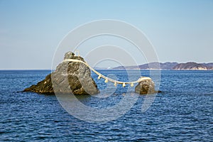 Meoto Iwa Rocks and blue sea in Ise, Mie, Japan photo