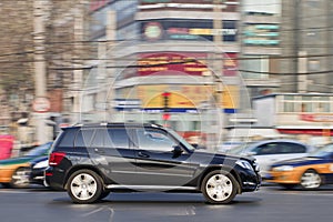 Mercedes-Benz GLK 350 4Matic in busy city center, Beijing, China