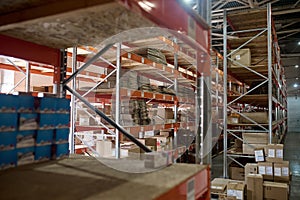 Merchandise in cartons stored on the storehouse shelves