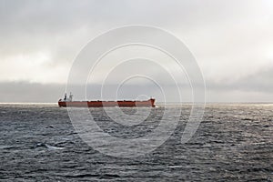 Merchant cargo ship in the ocean