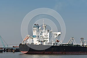 Merchant ship waiting for departure from its port