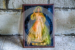 Merciful Jesus icon on old wall photo