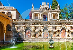 Mercury fountain at the real alcazar de Sevilla in Spain photo