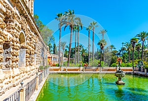 Mercury fountain at the real alcazar de Sevilla in Spain photo