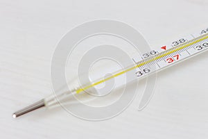 Mercury thermometer with celsius degrees, isolated. Medical thermometer on white background. Normal human temperature.