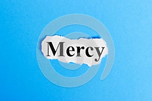 mercy text on paper. Word mercy on a piece of paper. Concept Image