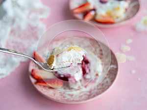 Merengo strawberry diet roll on pink background. Tea drinking. Healthy food, no sugar, no wheat flour. Top view, close