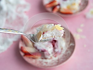 Merengo strawberry diet roll on pink background. Tea drinking. Healthy food, no sugar, no wheat flour. Top view, close