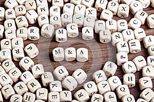 Mergers and Acquisitions abbreviation, letter dices word photo
