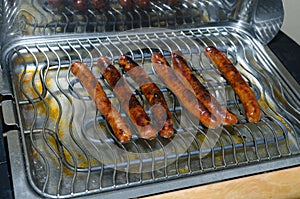 Merguez on the BBQ