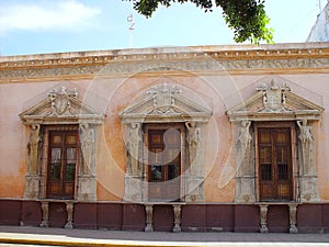 Merida city aged facade in Mexico photo