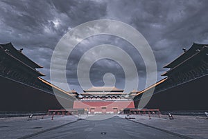 Meridian Gate against the background of the cloudy sky. Forbidden City, Beijing, China.