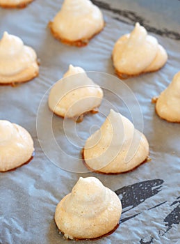 Meringue cookies on a tray photo