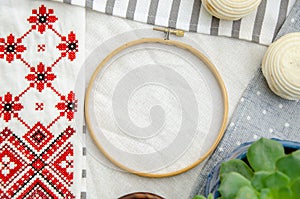 Meringue homemade zephyr marshmallows with round embroidery hoop frame, embroided napkin with traditional ornament and echeveria