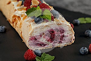 Meringue roll. Confectionery. Closeup