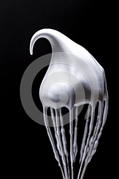 Meringue Whipped egg whites black background