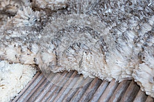 Merino wool on wooden sorting table