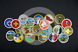 Merit badges on black