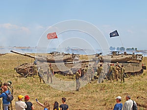 Merkava tanks and Israeli soldiers in training armored forces