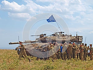 Merkava tanks and Israeli soldiers in training armored forces