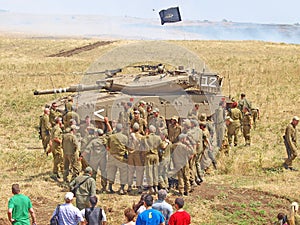 Merkava tanks and Israeli soldiers in training armored forces