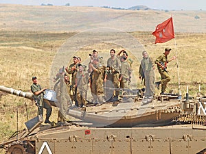 Merkava tanks and Israeli soldiers in training armored forces